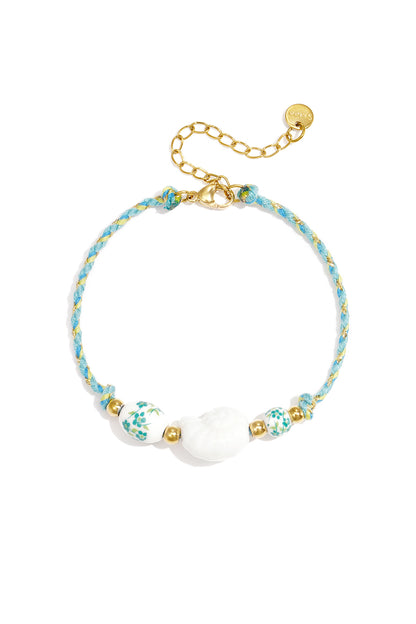 Seilarmband mit Perlen in Muschel- und Blumendesign