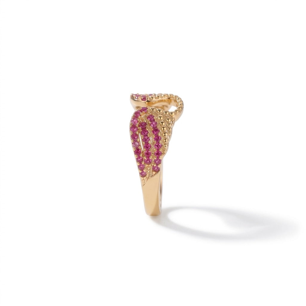 rubélie engelsflügel ring getragen hand rubinrot gold | eliée jewelry